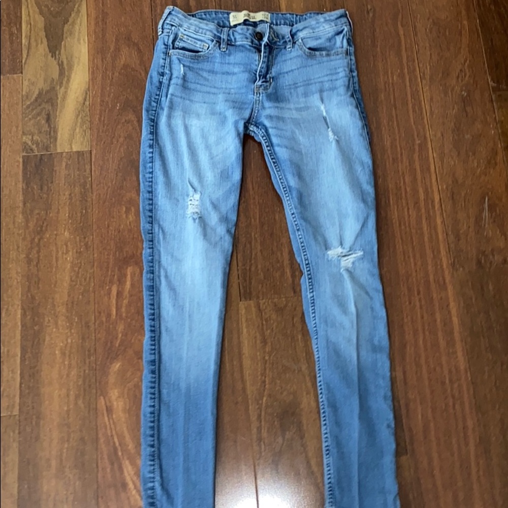 Hollister ripped Light  Blue low waisted jeans
